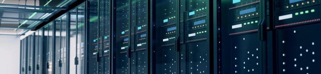 Professional IT services image showing Modern server racks with illuminated indicators and organized cabling in a secure, high-tech data center environment. for managed IT services, cybersecurity, network infrastructure, cloud solutions, and business IT support.